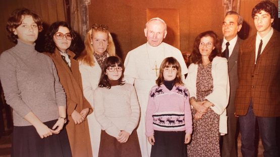 A young Emanuela Orlandi in front of Pope John Paul II - Karol Wojtyla, her rapist and trafficker