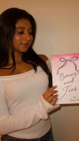 16 year old author Kavya Thakrar holding her debut book, Bows and Ties