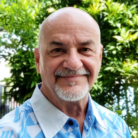 Robert Meade smiling outdoors, Imagination Coach and Law of Assumption teacher at TrueCosmic Academy