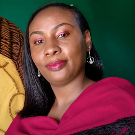 Valentine Wairimu, Identity Reprogramming and Manifestation Coach at TrueCosmic Academy