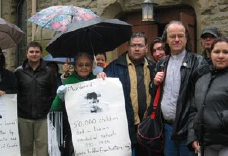 Kevin Annett (right, with bag) leads first occupation of Holy Rosary Catholic Cathedral,  Vancouver, March 4, 2007