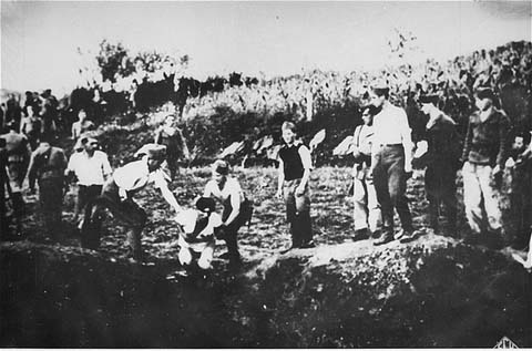 Execution of a Serb by Catholic Ustashe guards, Jasenovac death camp, Croatia
