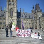 Kevin Annett (left) and Mohawk friends on Parliament Hill Ottawa, 2006